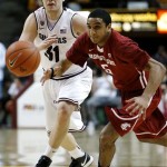 Arizona State's Jonathan Gilling (31) and Washington State's Will Dilorio (5) chase down a loose ball during the second half of an NCAA college basketball game, Wednesday, Feb. 20, 2013, in Tempe, Ariz. (AP Photo/Matt York)
