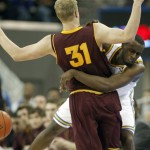 Arizona State forward Jonathan Gilling (31), of Denmark, and UCLA guard/forward Shabazz Muhammad (15) collide in the second half of an NCAA college basketball game in Los Angeles Wednesday, Feb. 27, 2013. UCLA won in overtime, 79-74. (AP Photo/Reed Saxon)
