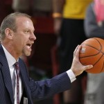 Utah head coach Larry Krystkowiak yells instructions to his players during the first half of an NCAA basketball game against Arizona State Thursday, Jan. 23, 2014, in Tempe, Ariz. (AP Photo/Ross D. Franklin)