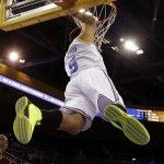 UCLA guard Kyle Anderson (5) slam dunks against Arizona State in the second half of an NCAA college basketball game in Los Angeles Wednesday, Feb. 27, 2013. UCLA won in overtime, 79-74. (AP Photo/Reed Saxon)
