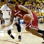 Washington State's DaVonte Lacy (3) drives past Arizona State's Jahii Carson (1) during the first half of an NCAA college basketball game, Wednesday, Feb. 20, 2013, in Tempe, Ariz. (AP Photo/Matt York)