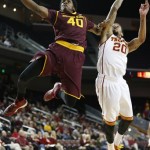 Arizona State's Shaquielle McKissic, left, goes to the basket to score past Southern California's J.T. Terrell during the first half of an NCAA college basketball game, Thursday, Jan. 9, 2014, in Los Angeles. (AP Photo/Danny Moloshok)