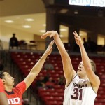 Arizona State's Jonathan Gilling shoots a 3-point basket over Texas Tech's Ty Nurse during an NCAA college basketball game in Lubbock, Texas, Saturday, Dec. 22, 2012. (AP Photo/Lubbock Avalanche-Journal, Zach Long) 