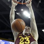 Arizona State center Rusian Pasteev (23), of Russia, slam dunks over UCLA in the first half of an NCAA college basketball game in Los Angeles Wednesday, Feb. 27, 2013. (AP Photo/Reed Saxon)