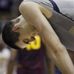 California's David Kravish closes his eyes during the second half of an NCAA college basketball game against Arizona State, Wednesday, Jan. 29, 2014 in Berkeley, Calif. Arizona State beat California 89-78 in overtime. (AP Photo/George Nikitin)
