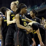 Arizona State's Eliza Normen, left, Peace Amukamara (11) and Kelsey Moos react following the team's 66-65 loss to Florida State following a women's college basketball regional semifinal game in the NCAA Tournament, Saturday, March 28, 2015, in Greensboro, N.C. (AP Photo/Gerry Broome)