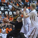 Arizona State's Eric Jacobsen (21) shoots against Oregon State's Daniel Gomis (14) during an NCAA college basketball game in Corvallis, Ore., Thursday Jan. 8, 2015. (AP Photo/Greg Wahl-Stephens)
