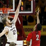Arizona State's Eric Jacobsen (21) goes up to block the shot of UNLV's Patrick McCaw (2) during the second half of an NCAA college basketball game Wednesday, Dec. 3, 2014, in Tempe, Ariz. Arizona State defeated UNLV 77-55. (AP Photo/Ross D. Franklin)