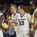 From left to right, Arizona State's Gerry Blakes, Jonathan Gilling, Bo Barnes, and Sai Tummala celebrate as Arizona State starts to pull away from UNLV during the second half of an NCAA college basketball game Wednesday, Dec. 3, 2014, in Tempe, Ariz. Arizona State defeated UNLV 77-55. (AP Photo/Ross D. Franklin)