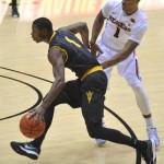 Arizona State's Roosevelt Scott (1) drives against Oregon State's Gary Payton II (1) during an NCAA college basketball game in Corvallis, Ore., Thursday Jan. 8, 2015. (AP Photo/Greg Wahl-Stephens)