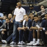 Connecticut's Ryan Boatright watches play from the Connecticut bench in the first half of an NCAA college basketball game against Arizona State in the first round of the NIT postseason tournament, Wednesday, March 18, 2015, in Storrs, Conn. (AP Photo/Jessica Hill)