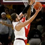 Utah's Delon Wright, rear, cannot stop a shot by Arizona State' Eric Jacobsen during the first half of an NCAA college basketball game, Thursday, Jan. 15, 2015, in Tempe, Ariz. (AP Photo/Matt York)