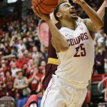 Washington State guard DaVonte' Lacy (25) drives to the basket past Arizona State forward Johnathan Gilling (31) during the first half of an NCAA college basketball game, Friday, Feb. 13, 2015, in Pullman, Wash. (AP Photo/Gary Breedlove)