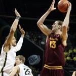 Arizona State's Jordan Bachynski, right, looks for an opening against Oregon's Tony Woods during the first half of an NCAA college basketball game in Eugene, Ore. Sunday Jan. 13, 2013. (AP Photo/Chris Pietsch)