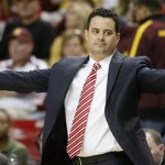 Arizona head coach Sean Miller raises his arms out as he looks to an official for a non-call against Arizona State during the second half of an NCAA basketball game, Saturday, Jan. 19, 2013, in Tempe, Ariz. Arizona won the game 71-54. (AP Photo/Ralph Freso)
