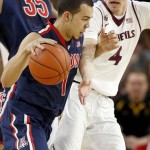 Arizona's Gabe York (1) is fouled by Arizona State's Bo Barnes (4) during the first half of an NCAA college basketball game on Friday, Feb. 14, 2014, in Tempe, Ariz. (AP Photo/Ross D. Franklin)