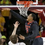 Utah's Princeton Onwas (3) blocks the shot of Arizona State's Bo Barnes (4) during the first half of an NCAA basketball game Thursday, Jan. 23, 2014, in Tempe, Ariz. (AP Photo/Ross D. Franklin)