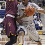California's Tyrone Wallace, right, drives for the basket as Arizona State's Bo Barnes defends during the first half of an NCAA college basketball game, Wednesday, Jan. 29, 2014, in Berkeley, Calif. (AP Photo/George Nikitin)