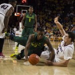 Oregon forward Elgin Cook, front left, is fouled by Arizona State forward Eric Jacobsen during an NCAA college basketball game on Saturday, Feb. 8, 2014, in Tempe, Ariz. (AP Photo/The Arizona Republic, Stacie Scott)