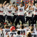 Arizona players do a victory dance after they defeated Boston College 42-19 in the AdvoCare V100 Bowl NCAA college football game Tuesday, Dec. 31, 2013, in Shreveport, La. (AP Photo/The Shreveport Times, Henrietta Wildsmith)