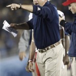 Arizona head coach Rich Rodriguez yells to players during the first half of their NCAA college football game against UCLA, Saturday, Nov. 3, 2012, in Pasadena, Calif. (AP Photo/Jason Redmond)