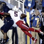 UCLA wide receiver Jordan Payton, left, makes a catch for a touchdown as Arizona cornerback Shaquille Richardson (5) defends during the first half of their NCAA college football game, Saturday, Nov. 3, 2012, in Pasadena, Calif. (AP Photo/Jason Redmond)