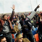 Adam Gottschalk, left Victor Yates, center, and Frank Apodaca cheer for the Arizona as they defeat Boston College 42-19 in the AdvoCare V100 Bowl NCAA college football game Tuesday, Dec. 31, 2013, in Shreveport, La. (AP Photo/The Shreveport Times, Henrietta Wildsmith) 