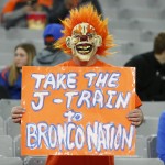 A Boise State fan holds up sign prior to the Fiesta Bowl NCAA college football game against Arizona, Wednesday, Dec. 31, 2014, in Glendale, Ariz. (AP Photo/Ross D. Franklin)
