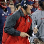Arizona coach Rich Rodriguez reacts to a play against Colorado during the second half of an NCAA college football game, Saturday, Nov. 8, 2014, in Tucson, Ariz. (AP Photo/Rick Scuteri)