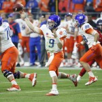Boise State quarterback Grant Hedrick (9) throws against Arizona during the first half of the Fiesta Bowl NCAA college football game, Wednesday, Dec. 31, 2014, in Glendale, Ariz. (AP Photo/Ross D. Franklin)