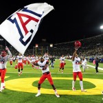 Arizona players celebrate after beating Oregon in the NCAA college football game at Autzen Stadium on Thursday, Oct. 2, 2014, in Eugene, Ore. Arizona won the game 31-24.(AP Photo/Steve Dykes)