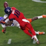 Boise State cornerback Donte Deayon breaks up a pass intended for Arizona running back Samajie Grant (10) during the first half of the Fiesta Bowl NCAA college football game, Wednesday, Dec. 31, 2014, in Glendale, Ariz. (AP Photo/Matt York)