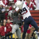 Arizona wide receiver Austin Hill (29) catches a pass while Washington State cornerback Pat Porter defends during the first quarter of an NCAA college football game Saturday, Oct. 25, 2014, in Pullman, Wash. (AP Photo/Dean Hare)