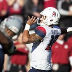 Arizona quarterback Anu Solomon throws a pass against Washington State during the first quarter of an NCAA college football game Saturday, Oct. 25, 2014, in Pullman, Wash. (AP Photo/Dean Hare)