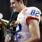 Boise State's Thomas Sperbeck smiles as he holds the Offensive MVP Trophy after the Fiesta Bowl NCAA college football game against Arizona, Wednesday, Dec. 31, 2014, in Glendale, Ariz. Boise State won 38-30. (AP Photo/Ross D. Franklin)