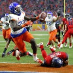 Boise State running back Jay Ajayi (27) scores a touchdown against Arizona during the first half of the Fiesta Bowl NCAA college football game, Wednesday, Dec. 31, 2014, in Glendale, Ariz. (AP Photo/Ross D. Franklin)