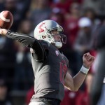 Washington State quarterback Connor Halliday throws a pass against Arizona during the first quarter of an NCAA college football game Saturday, Oct. 25, 2014, at Martin Stadium in Pullman, Wash. (AP Photo/Dean Hare)
