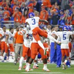 Boise State cornerback Cleshawn Page (3) celebrates an interception against Arizona during the first half of the Fiesta Bowl NCAA college football game, Wednesday, Dec. 31, 2014, in Glendale, Ariz. (AP Photo/Ross D. Franklin)