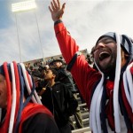 Arizona fans Joe Sobansky, right, and Jonathan Bradford cheer during the AdvoCare V100 Bowl Tuesday afternoon, Dec. 31, 2013, in Shreveport, La. Arizona played Boston College in the NCAA college football bowl game.(AP Photo/The Shreveport Times, Henrietta Wildsmith)