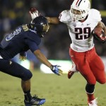 Arizona wide receiver Austin Hill (29) carries the ball as UCLA cornerback Randall Goforth (3) defends during the first half of their NCAA college football game, Saturday, Nov. 3, 2012, in Pasadena, Calif. (AP Photo/Jason Redmond)
