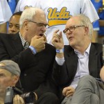  Former NBA coach Phil Jackson, left, and actor John Lithgow talk as they watch UCLA play Arizona during the first half of an NCAA college basketball game on Thursday, Jan. 9, 2014, in Los Angeles. (AP Photo/Mark J. Terrill)