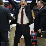 Arizona head coach Sean Miller reacts to an official's call during the second half of an NCAA college basketball game against Colorado at McKale Center in Tucson, Ariz., Thursday, Jan 3, 2013. Arizona won 92-83 in overtime. (AP Photo/John Miller)