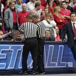 Arizona head coach Sean Miller, far right, waits for the officials as they review a shot before calling for overtime in an NCAA college basketball game against Colorado in McKale Center in Tucson, Ariz., Thursday, Jan 3, 2013. Arizona won 92-83 in overtime. (AP Photo/John Miller)