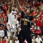 Arizona's Mark Lyons (2) shoots over California's Richard Solomon (35) during the second half of an NCAA college basketball game at McKale Center in Tucson, Ariz., Sunday, Feb. 10, 2013. California won 77-69. (AP Photo/Wily Low)
