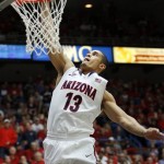 Arizona's Nick Johnson goes to the basket for an easy lay-up against Fairleigh Dickinson in the first half of an college NCAA basketball game, Monday, Nov. 18, 2013 in Tucson, Ariz. This is in the first round of the Preseason NIT. (AP Photo/John Miller)