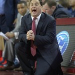 Arizona head coach Sean Miller yells to his team during the second half of an NCAA college basketball game against Southern California, Sunday, Jan. 12, 2014, in Los Angeles. (AP Photo/Mark J. Terrill)