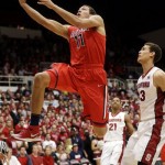Arizona forward Aaron Gordon (11) drives to the basket past Stanford forward Dwight Powell, right, during the first half of an NCAA college basketball game on Wednesday, Jan. 29, 2014, in Stanford, Calif. (AP Photo/Marcio Jose Sanchez)