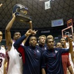 Arizona holds up the Diamond Head Classic championship trophy after beating San Diego State in an NCAA college basketball game at Tuesday, Dec. 25, 2012, in Honolulu. Arizona defeated San Diego State 68-67. (AP Photo/Eugene Tanner)