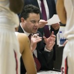Arizona coach Sean Miller diagrams a play for his team during the second half of an NCAA college basketball game against Washington State at McKale Center in Tucson, Ariz., Saturday, Feb. 23, 2013. (AP Photo/Wily Low)
