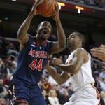 Arizona's Solomon Hill, left, drives to the basket past Southern California's Byron Wesley during the first half of an NCAA college basketball game in Los Angeles, Wednesday, Feb. 27, 2013. (AP Photo/Jae C. Hong)